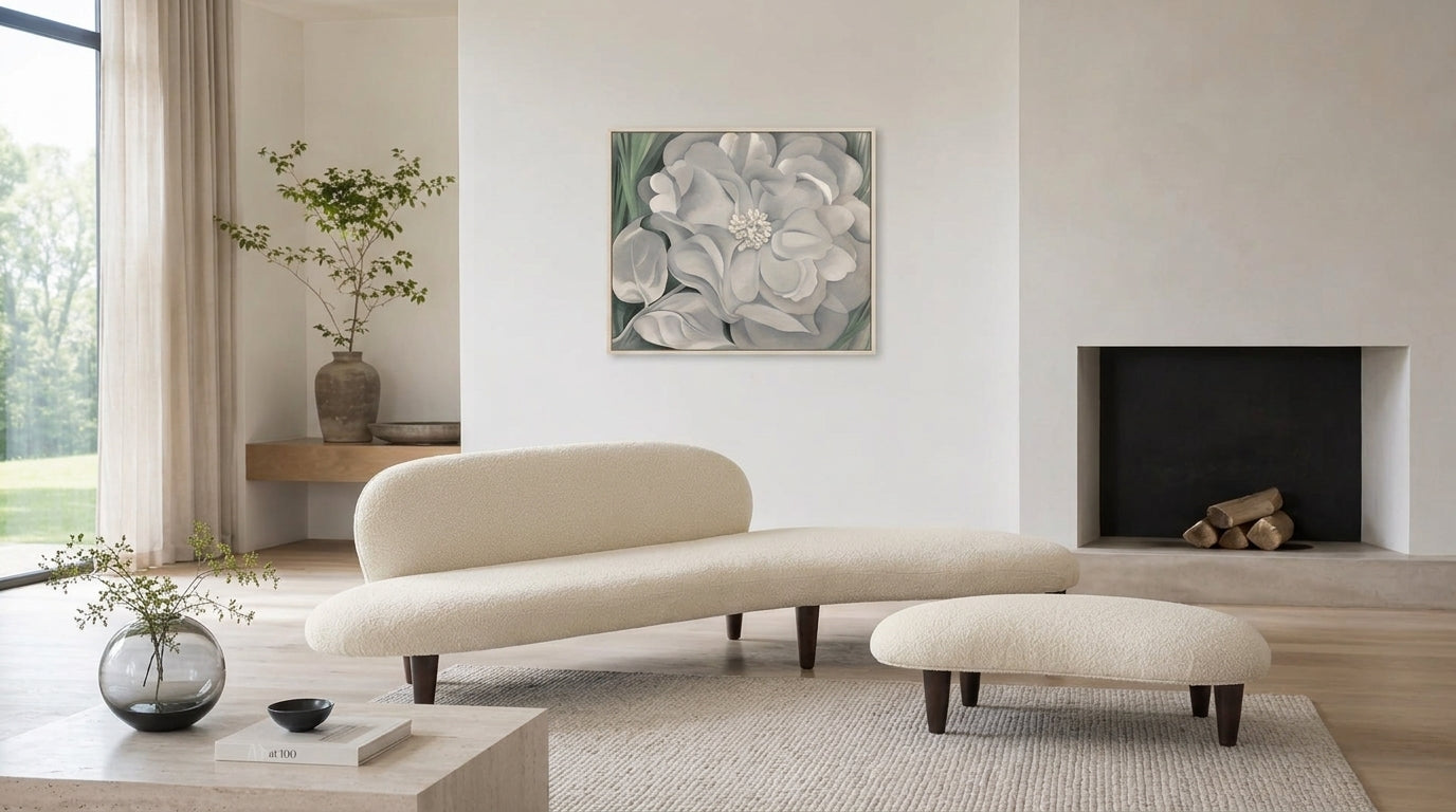 Georgia O’Keeffe floral artwork styled with a minimalist cream sofa.